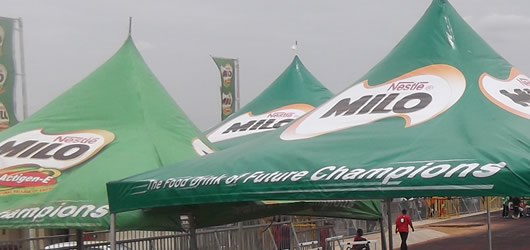 An image of a village fayre with Otaten branded tents