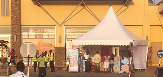 An image of a village fayre with an Otaten commercial tent